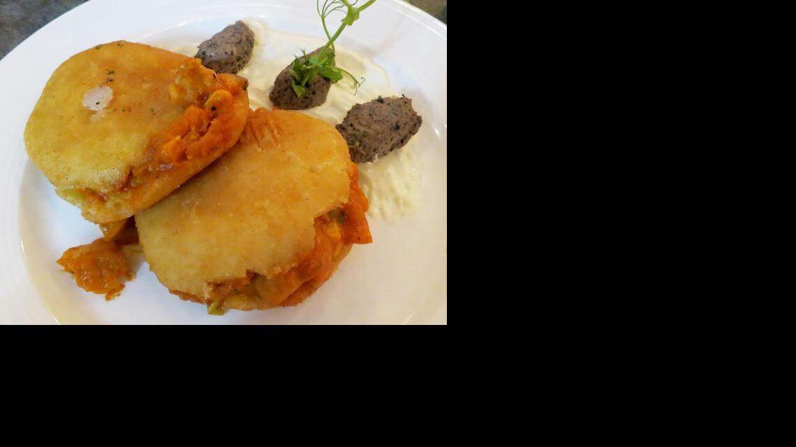 
The Spiny Lobster arepas at Taste and See are corn cakes stuffed with lobster and corn.
