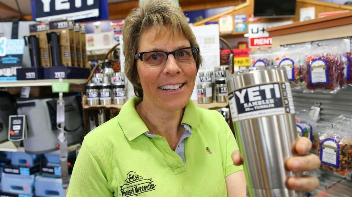 Leslye Woodard of Woodard Mercantile in Maize sells Yeti products.