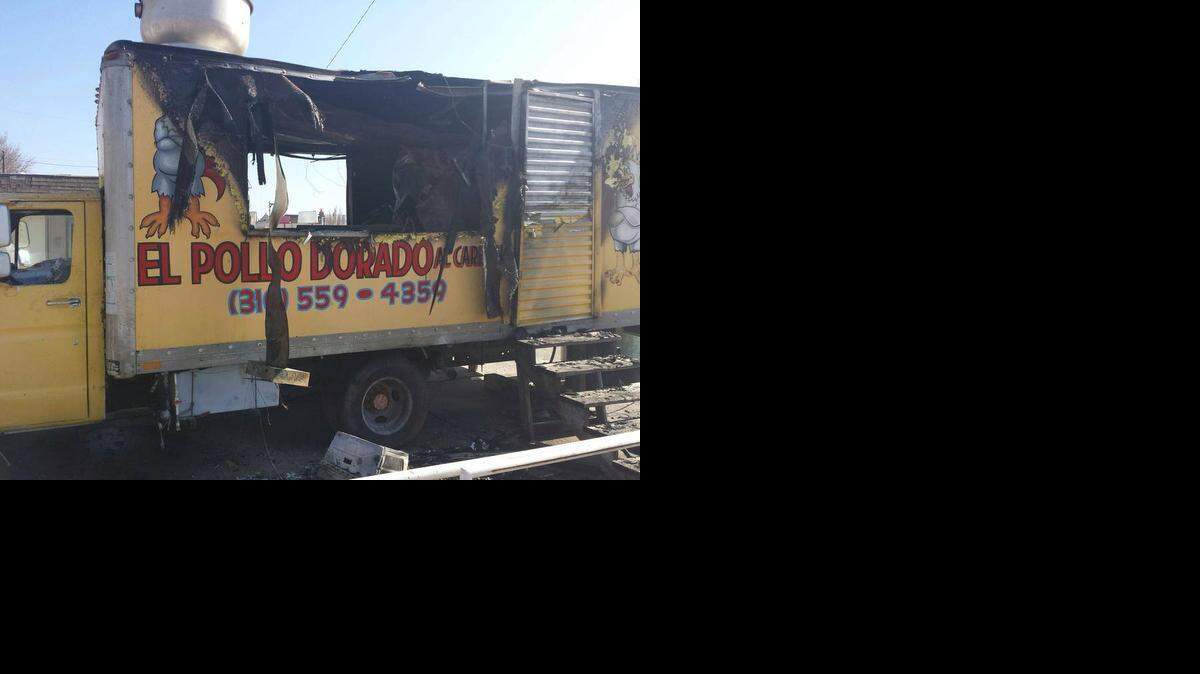 
The aftermath of a fire that destroyed the El Pollo Dorado al Carbon truck.
