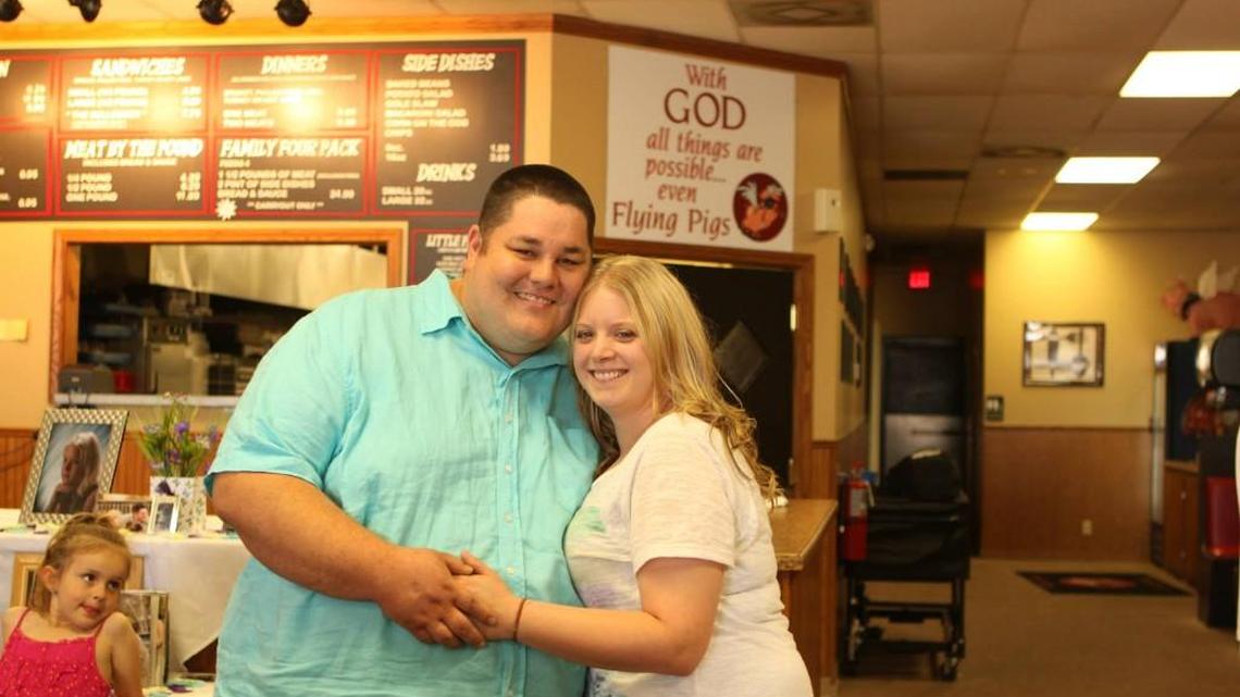 A year ago, When Pigs Fly owner Brian Choy, pictured here with his wife, Kendray, weighed almost 500 pounds and felt terrible, he said.