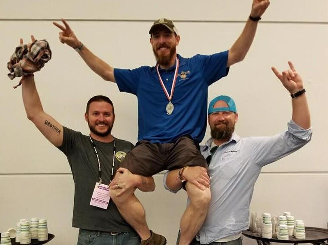 Wichita Brewing Company and its staff, including co-owner Jeremy Horn, left, and Kyle Banick, right, and brewer Ned Vahsholtz, are bringing Tallgrass beer back to life.