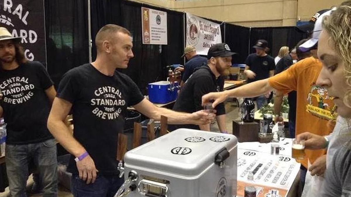 Central Standard Brewing co-founder Andy Boyd serves beer at last year’s Midwest Beerfest. The Wichita/Kansas section of the beerfest was the most crowded last year.