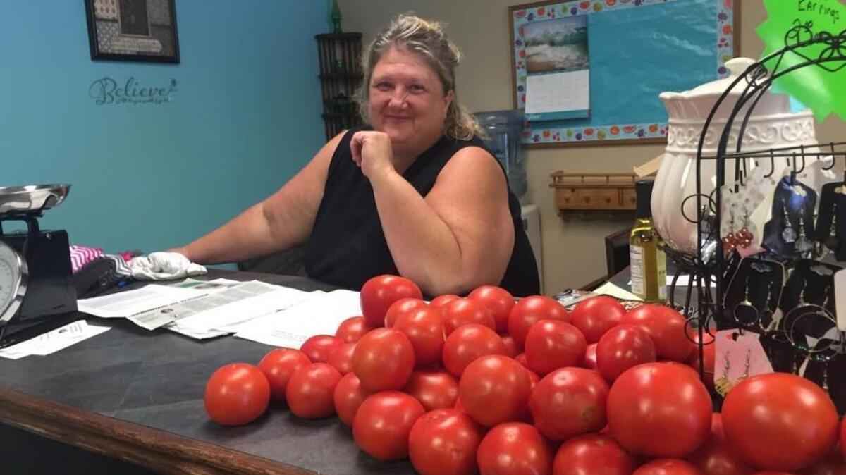 CC Robertson and her friend just opened Kountry Kubbard, a combination produce market, cafe and boutique. And she has a lot of ripe tomatoes for sale.