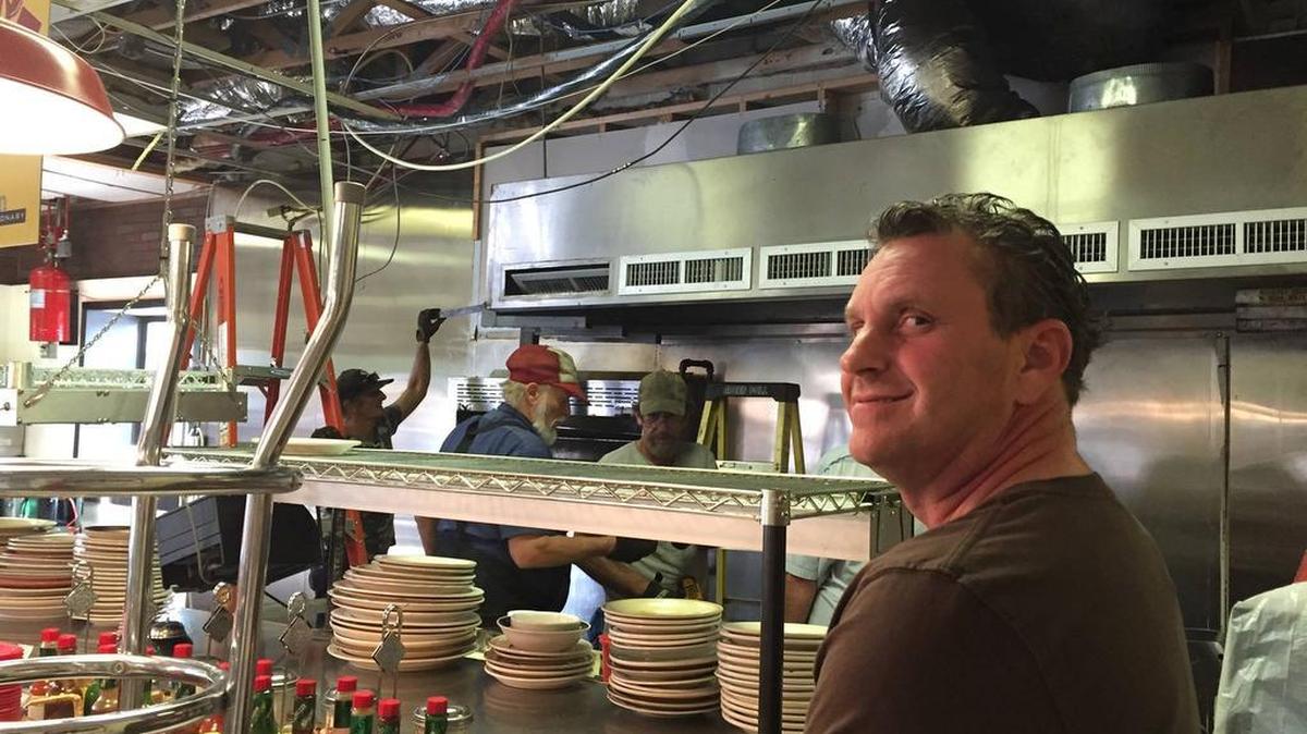 
Doo-Dah Diner chef and owner Patrick Shibley with workers in his restaurant on Monday morning. The diner is undergoing a major kitchen renovation that will keep it closed most of the week.
