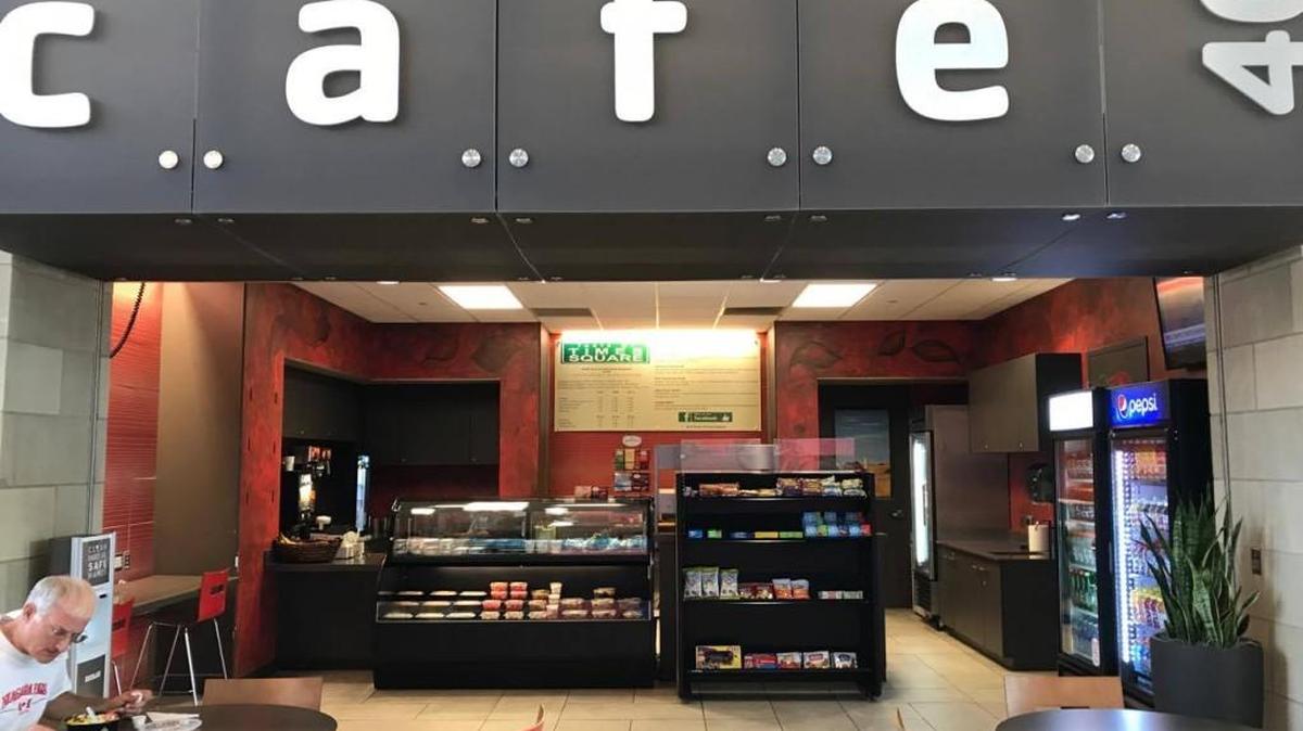 The cafe inside the Downtown YMCA is back in business and is now A Taste of Times Square at Cafe 402.