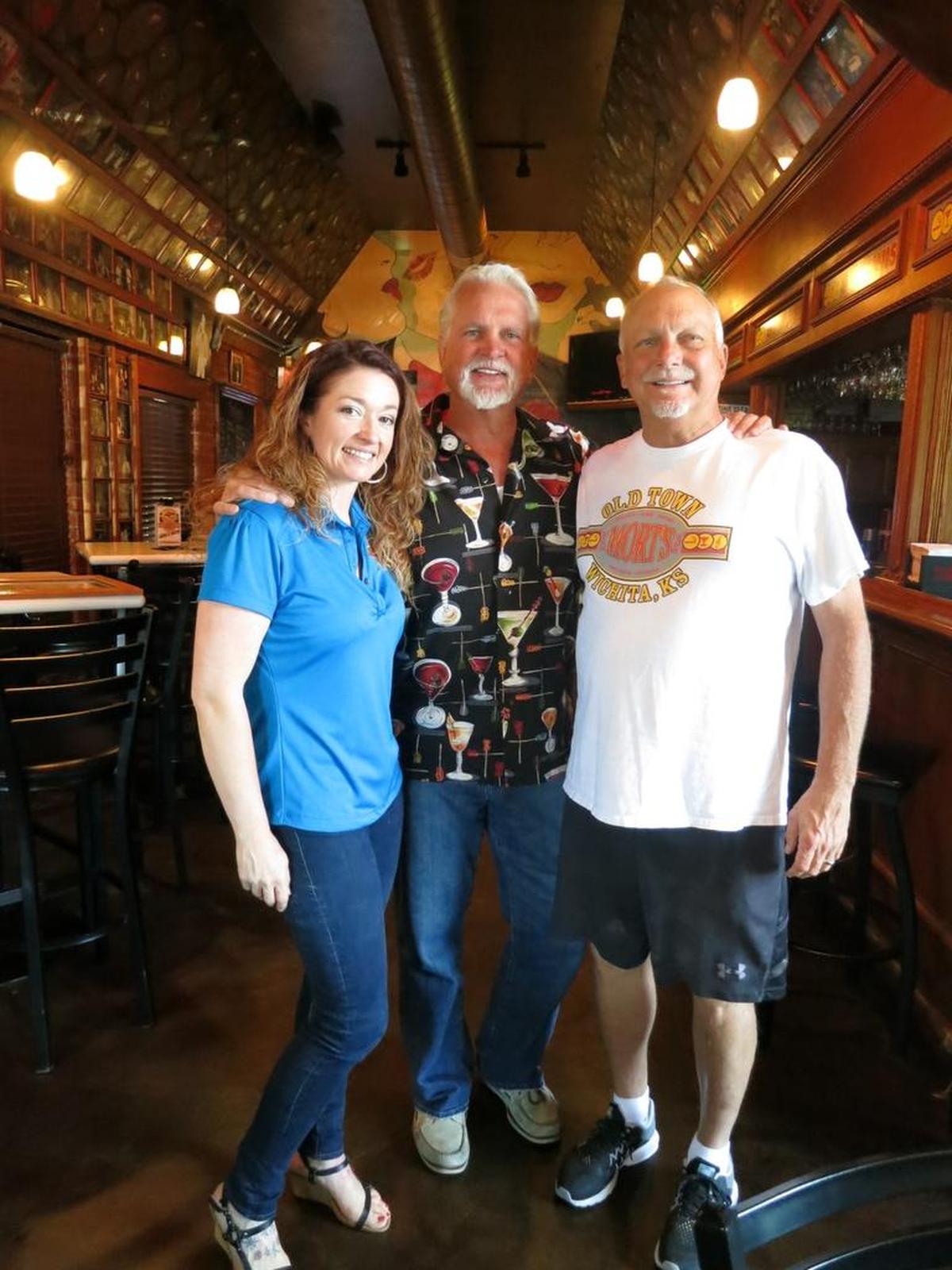 Mort’s Martini & Cigar Bar’s owners Emma Russell, Morrie Sheets and Matt Sheets are pictured when the bar turned 20 in 2016. Matt Sheets died three years later.
