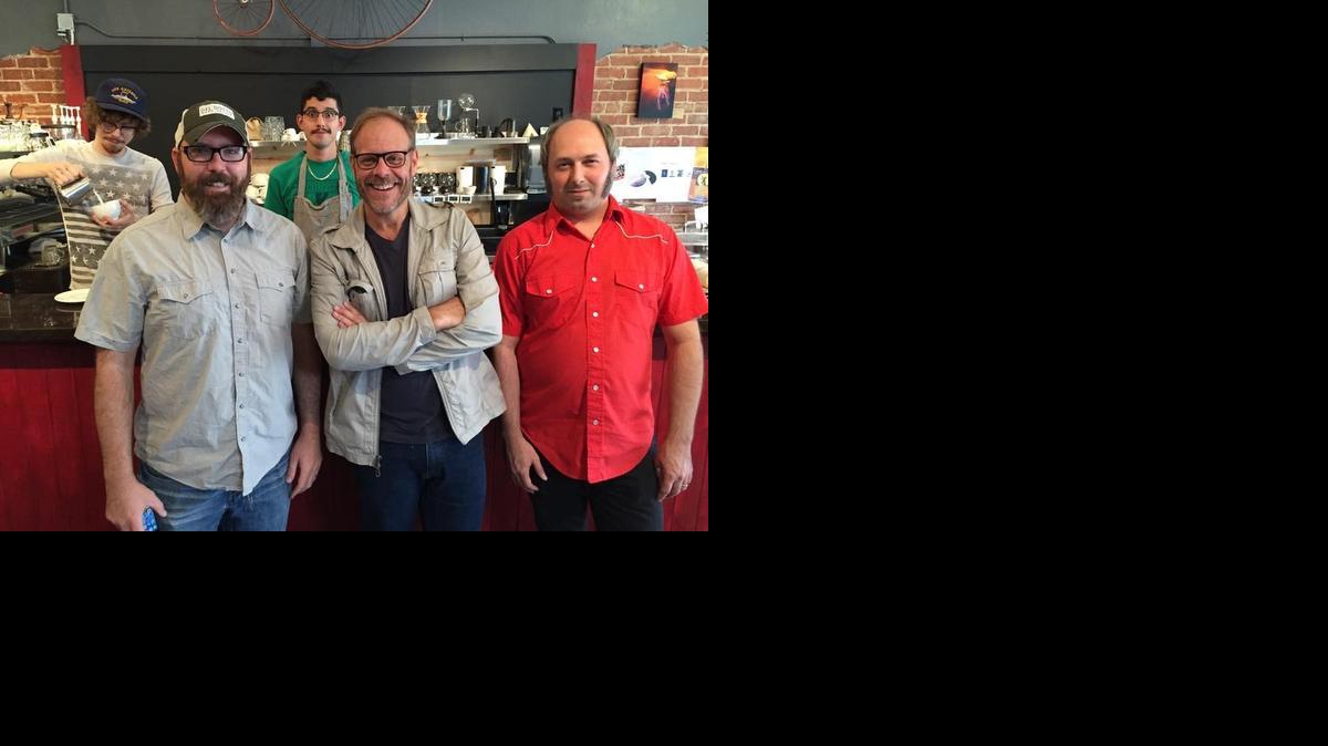 
Alton Brown, center, during his stop at Reverie Coffee Roasters in October
