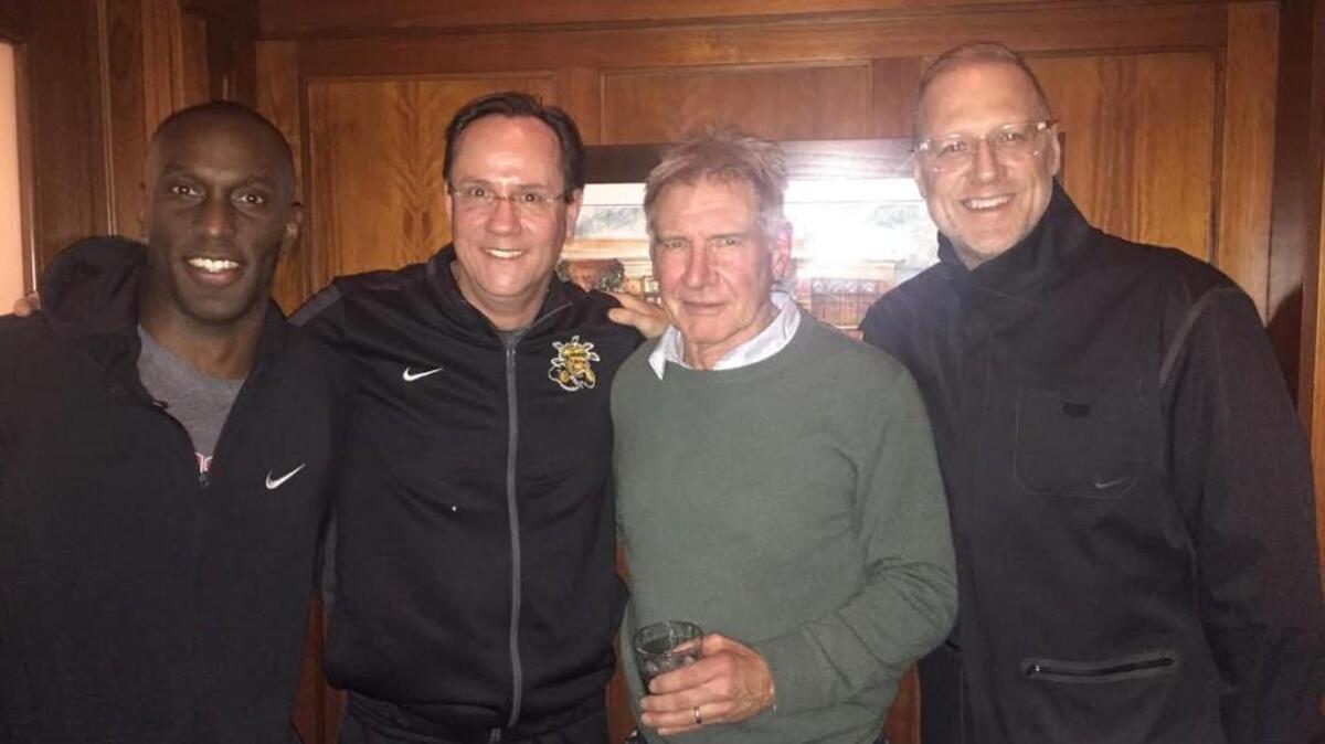 Wichita State University Coach Gregg Marshall, second from left, met Harrison Ford at Chester’s Chophouse last weekend and even performed some lines from “The Fugitive” for him. Also pictured are Devon Smith, a member of Marshall’s coaching staff, far left, and Eric Lautenbach, director of college basketball for Nike Inc., far right.