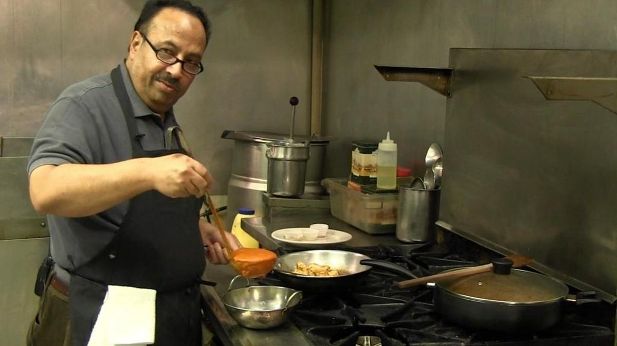 Syed Quettawaala, owner of Zaytun Bistro, demonstrates how to make Chicken makhani during the first in a video series called “ICT Restaurant Recipes.” Chicken makhani translates to butter chicken. (Jan. 15, 2016)
