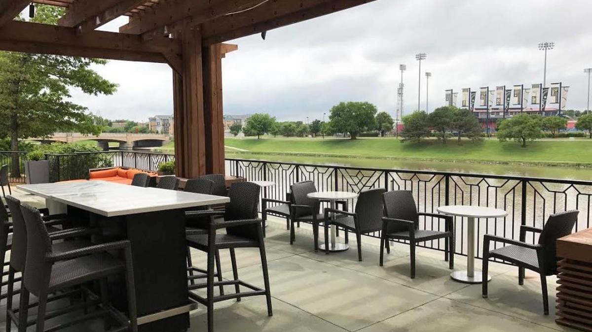 The Hyatt’s new owners plan a riverfront gastropub to replace Harvest.