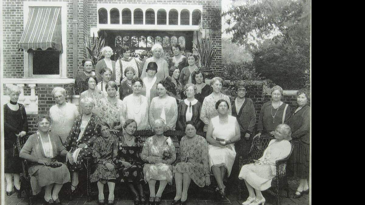 
The Thursday Afternoon Cooking Club of 1928 poses in front of what is the 2003 Symphony Showhouse in College Hill. The club has been meeting since the late 1800s and they meet once a month when a different hostess serves lunch and shares the recipes with its members. 
