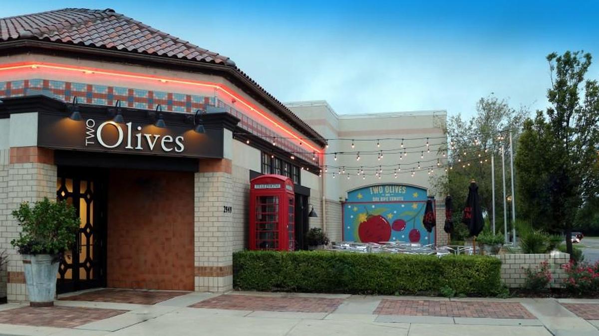 Two Olives originally was set to open today, but the owners say they need more time for training and test runs.