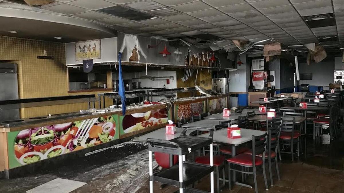 The day after a fire broke out in the ceiling of Alberto’s Pizzeria Buffet, there were still puddles on the floor.