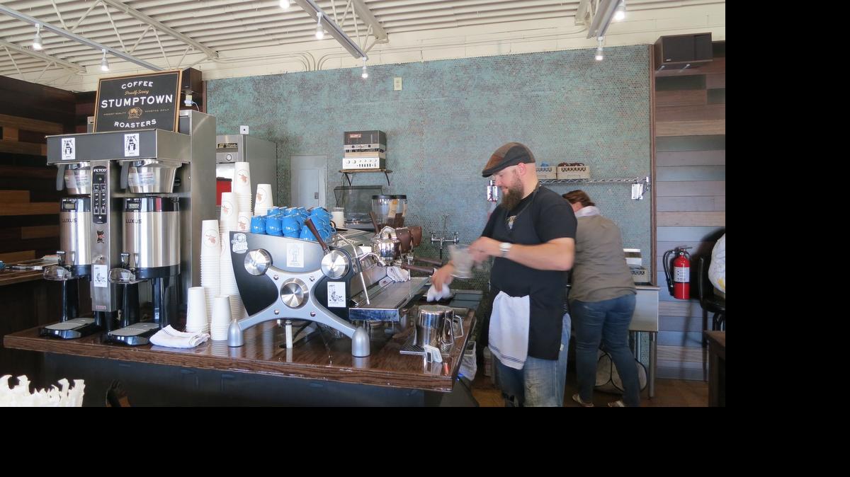 
Verita Coffee Co. owner Jon Jones prepares drinks in full view of his customers.
