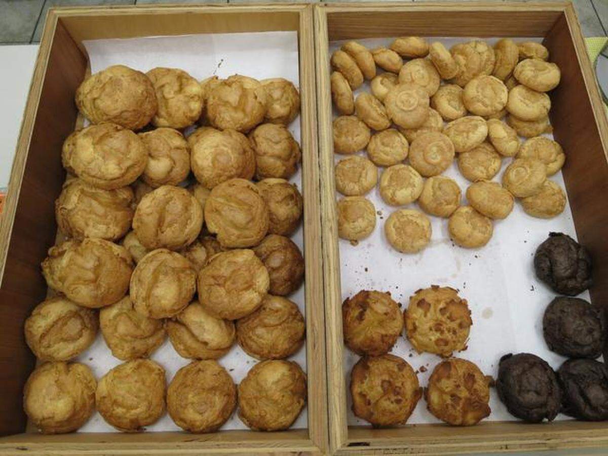 Empty cream puff shells await filling at Beard Papa’s.