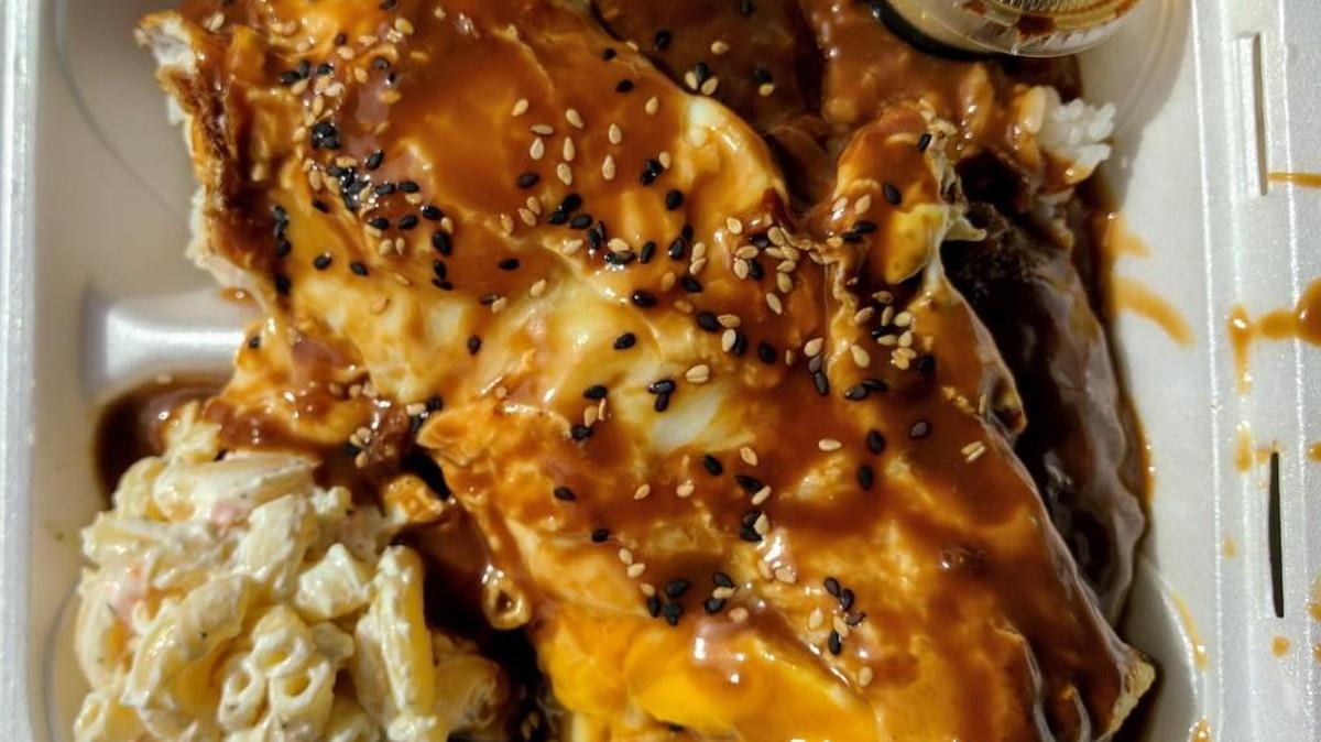 Huli huli chicken, like many dishes at Noble House, is served with a side of macaroni salad.
