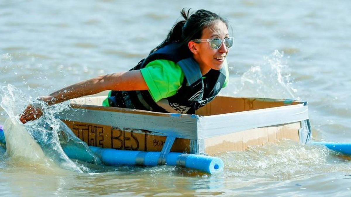 Carla Sisson paddles her way to victory during the Cardboard Regatta on the final day of Riverfest in 2015.