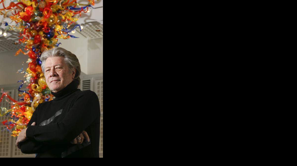 
Opera star Samuel Ramey, seen here in front of the Dale Chihuly piece in the grand hall of the Wichita Art Museum, will perform “Bluebeard’s Castle” with the Wichita Symphony Orchestra next weekend. He’ll be joined on stage by 9,000 pounds of Chihuly glass.
