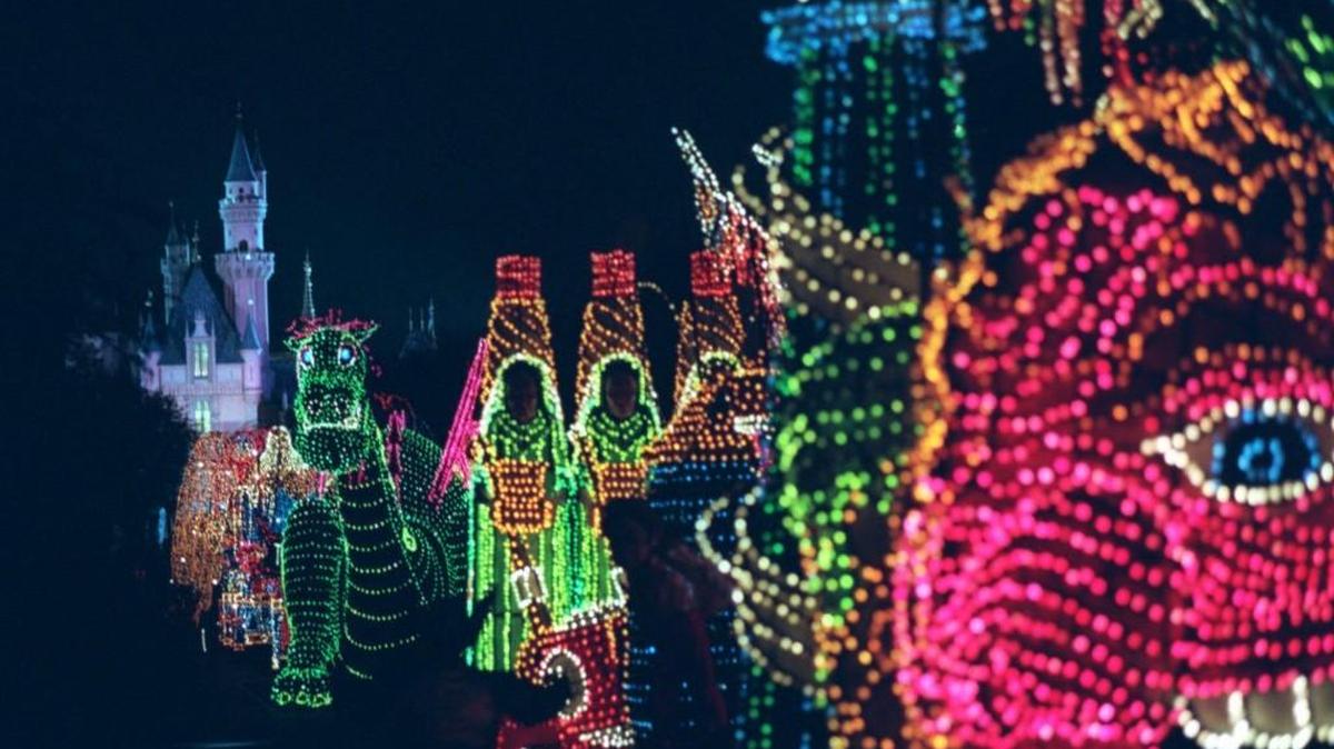The Main Street Electrical Parade moves down Main Street in Disneyland in Anaheim, Calif., during its last night of performances in 1996. Disney says the parade will return to Disneyland for a limited run after it ends its run at Walt Disney World in Florida in October.