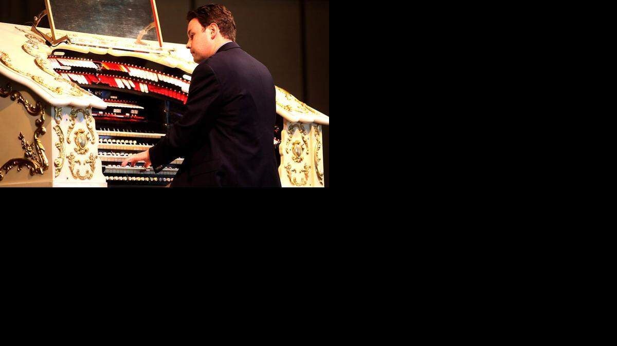 
First United Methodist Church organist Brett Valliant plays on the Wurlitzer organ at Century II.
