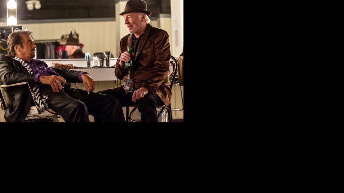 
Al Pacino, left, and Christopher Plummer star in “Danny Collins.”
