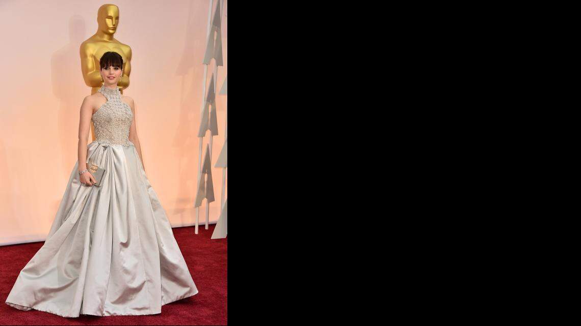 
Felicity Jones’ Alexander McQueen frock has so much going on, we don’t know where to look first. The top half makes a bold statement the bottom half doesn’t deliver.
