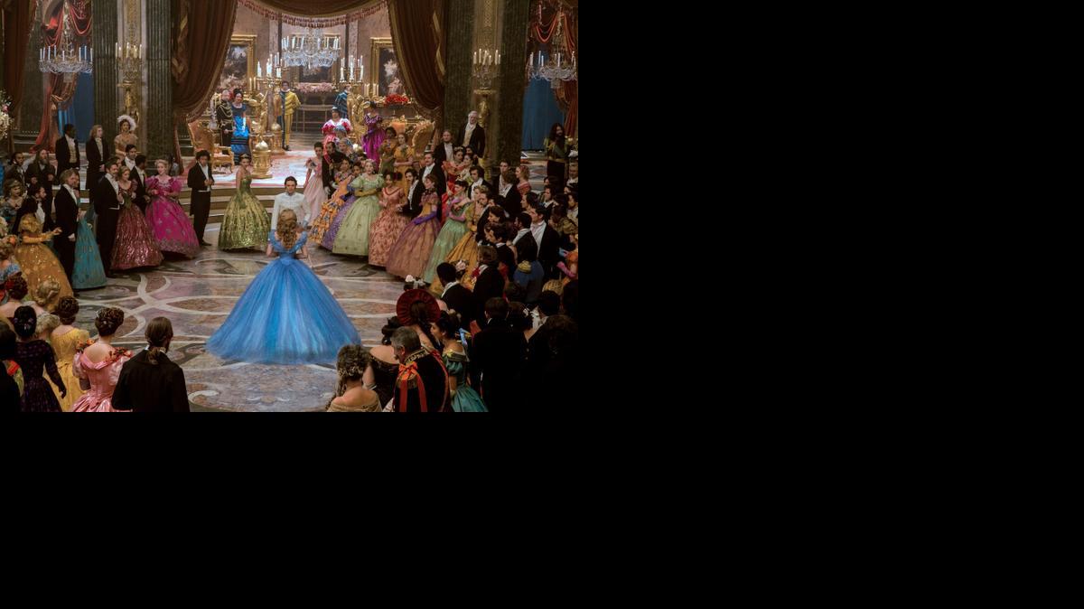 
Cinderella (Lily James) and Kit (Richard Madden) are the focus of the ball in “Cinderella.”

