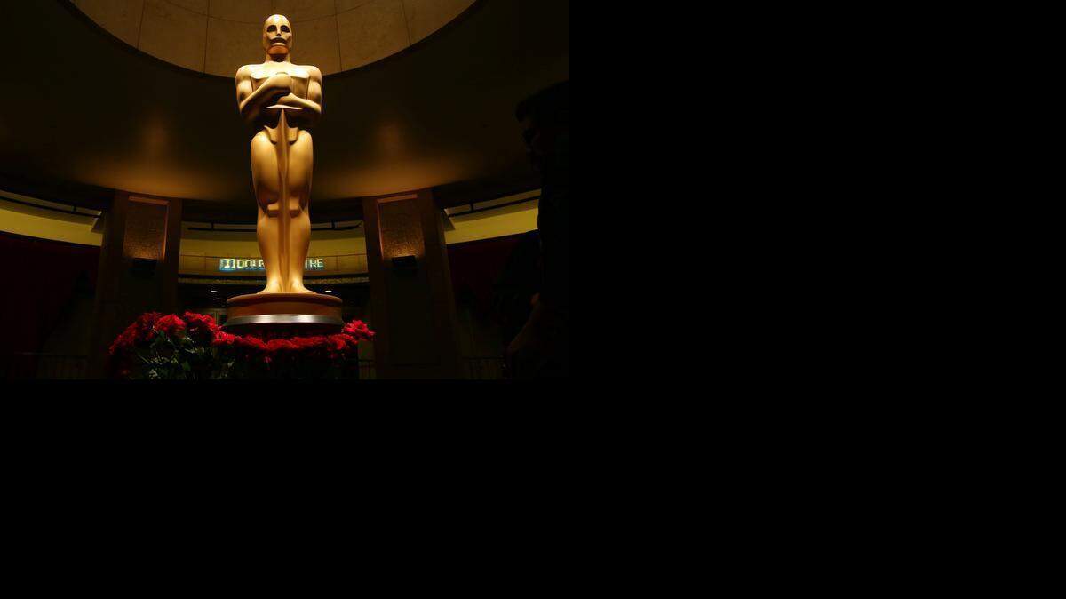 
An Oscar statue is seen as preparations are made for the 87th Academy Awards in Los Angeles, Saturday, Feb. 21, 2015. The Academy Awards will be held at the Dolby Theatre on Sunday, Feb. 22. 

