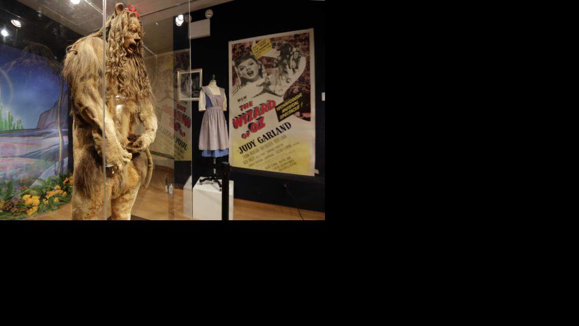 
This Nov. 21, 2014 photo shows Bert Lahr's Cowardly Lion costume and a three-sheet poster from "The Wizard of Oz," part of the "There's No Place Like Hollywood" movie memorabilia auction at Bonhams auction house in New York. Lahr’s costume was auctioned with other Hollywood items Monday, Nov. 24, 2014, in New York. 
