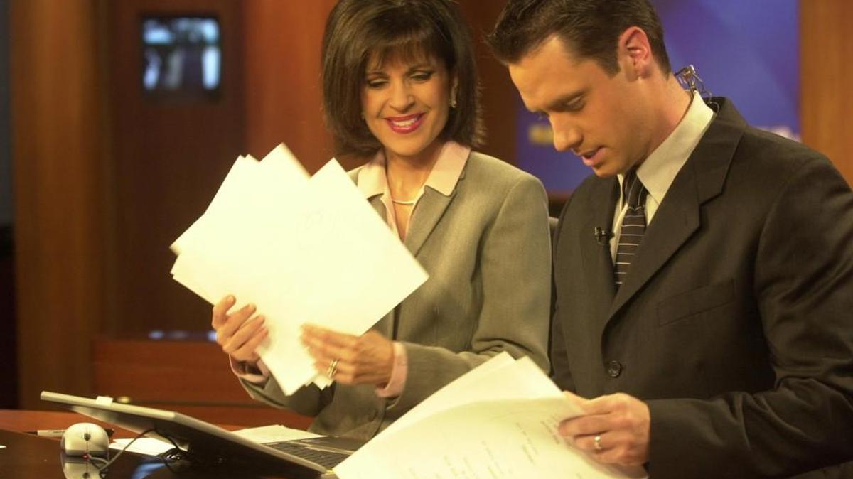 Susan Peters and Jeff Herndon, in a photo from 2004, were longtime evening news anchors for KAKE.