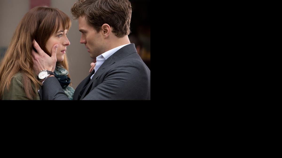 
Anastasia (Dakota Johnson) enters into a dangerous affair with Christian (Jamie Dornan) in “Fifty Shades of Grey.” 
