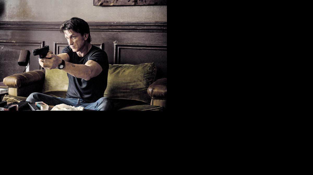 
Sean Penn stars as a former agent who tries to find out who wants him dead in “The Gunman.”
