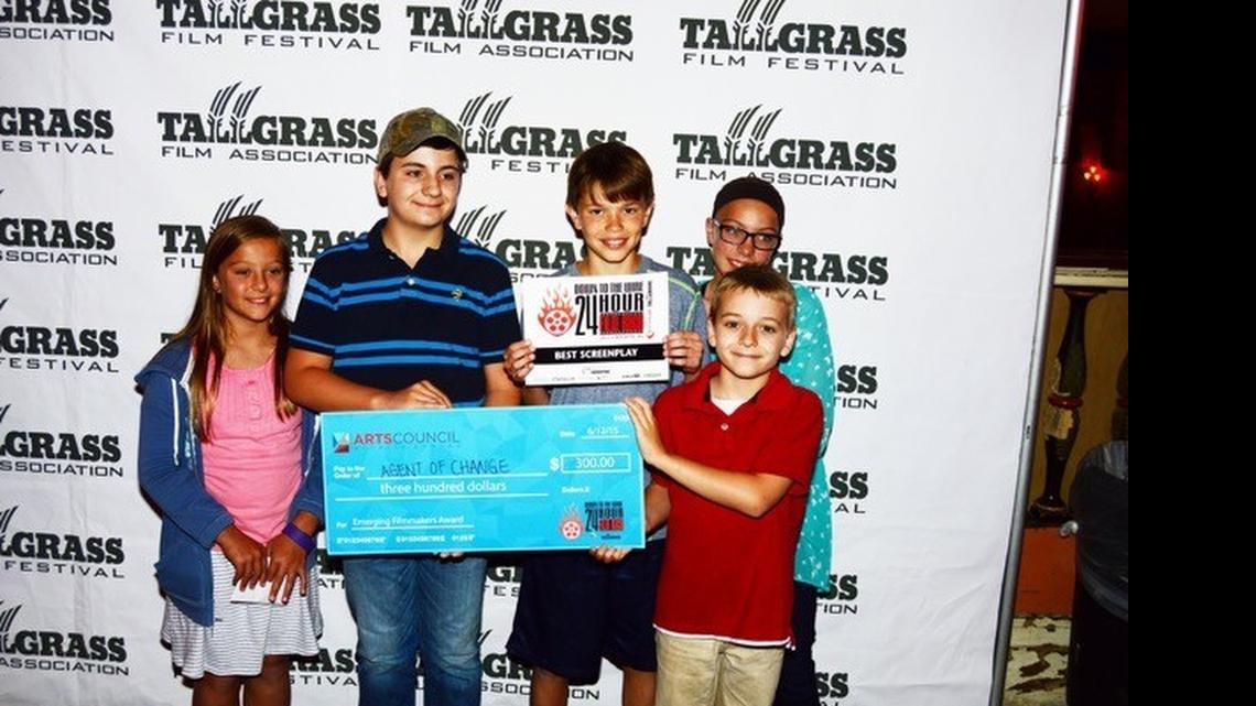 
Levi Feil, second from left, won Best Screenplay, and the Emerging Student Filmmaker award, at Tallgrass Film Festival’s Down to the Wire competition. Joining him from left are Avery Linden, Cooper Galyon, McKenna Linden and Malachi Feil.
