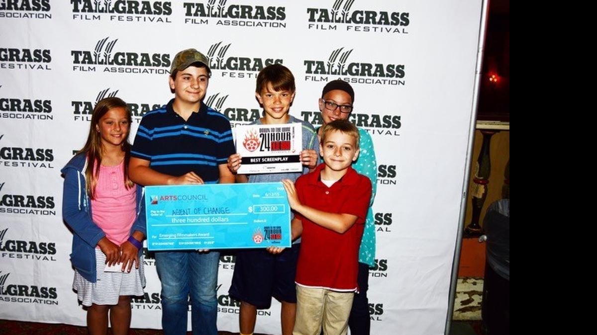
Levi Feil, second from left, won Best Screenplay, and the Emerging Student Filmmaker award, at Tallgrass Film Festival’s Down to the Wire competition. Joining him from left are Avery Linden, Cooper Galyon, McKenna Linden and Malachi Feil.
