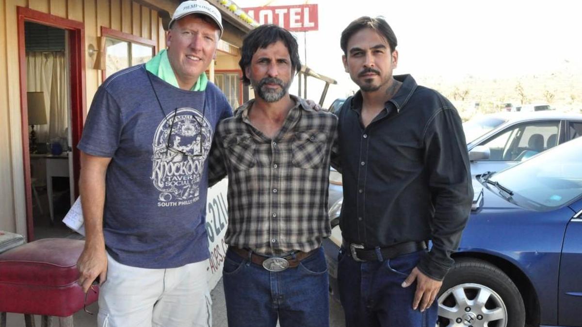 
Director Greg Norman, left, on the set of “The Boatman.”
