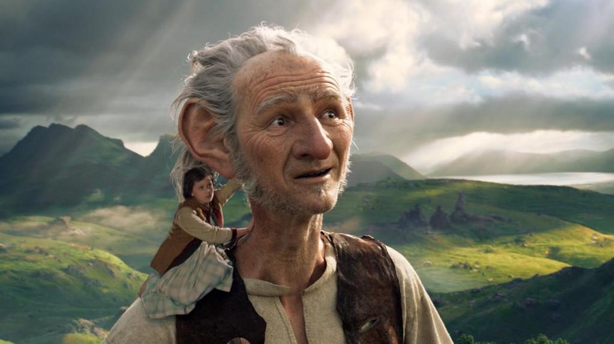 This image released by Disney shows Ruby Barnhill and the Big Friendly Giant from Giant Country, voiced by Mark Rylance, in a scene from “The BFG.”