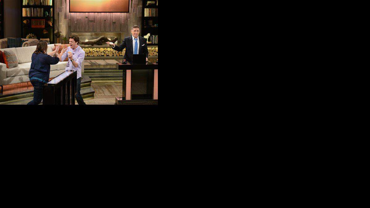
This undated photo provided by FremantleMedia North America & Debmar-Mercury shows host Craig Ferguson, right, with contestants on “Celebrity Name Game.” The game show, produced by Courtney Cox and David Arquette, debuts Monday, Sept. 22, 2014, in syndication. 

