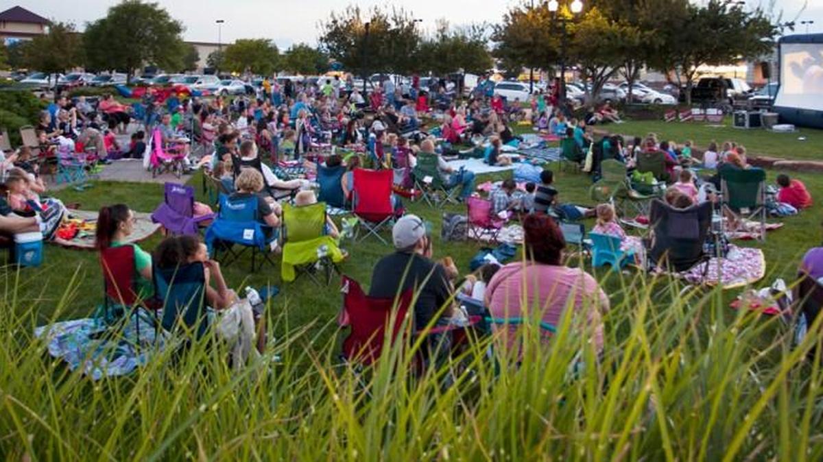 Big crowds always gather for the outdoor family movies at NewMarket Square. The animated version of “The Jungle Book” will be shown on Saturday.
