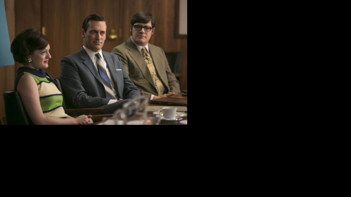 
Elisabeth Moss, from left, Jon Hamm and Rich Sommer star in “Mad Men.” The final season premieres Sunday at 9 p.m. on AMC. (
