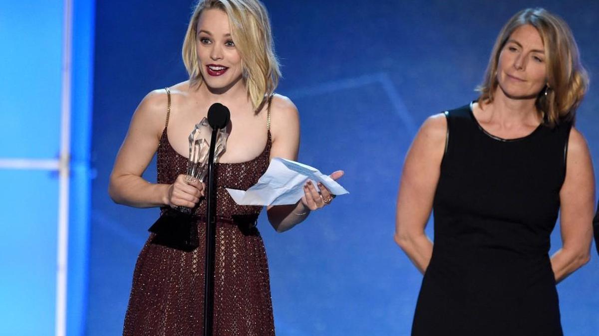 Rachel McAdams, left, and journalist Sacha Pfeiffer accept the award for best acting ensemble for “Spotlight” at the 21st annual Critics’ Choice Awards on Sunday. McAdams plays Pfeiffer in the film.