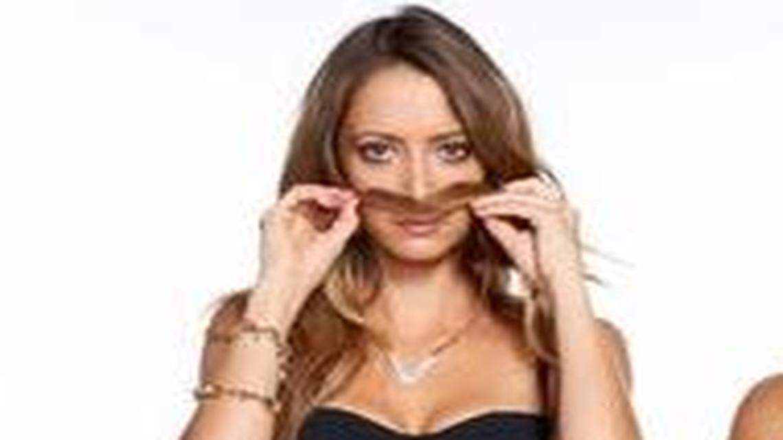 
Taryn Southern, left, as she appears in the October issue of Seventeen magazine.
