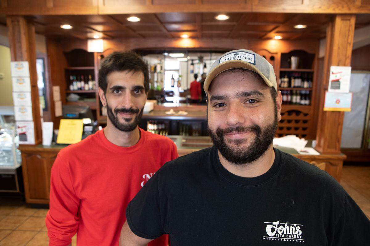Nick Srour, right, and John Srour are celebrating the birthday of N&J Cafe, their family restaurant, which they bought last year.