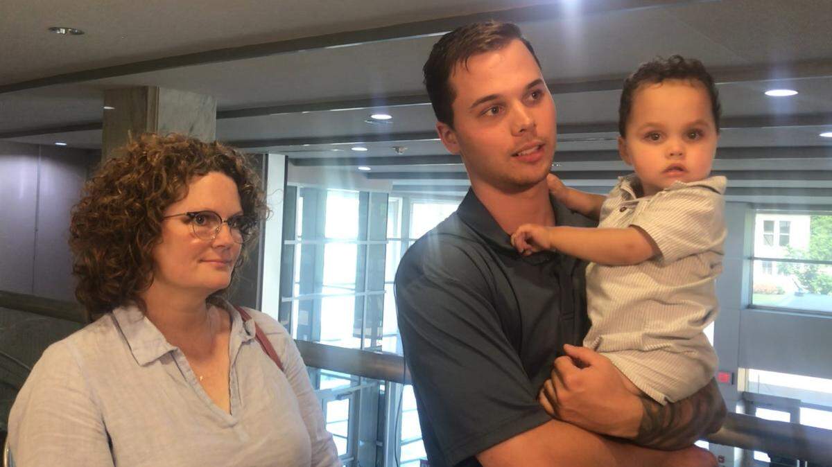 Samantha Russell’s mother, Lischen Castorena, and husband, Brandon Russell, talk to reporters Thursday after jurors handed down guilty verdicts in the crash that fatally injured her on July 6, 2021, while she was pregnant. Brandon is holding their son, Mac, whom doctors delivered in the aftermath of the collision.