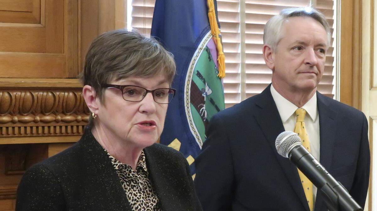 Kansas Gov. Laura Kelly, left, introduces Jeffry Jack, right, as her nominee for a seat on the state Court of Appeals, during a news conference March 15 at the Statehouse in Topeka. Jack is a Labette County district court judge who previously served in the Kansas House.