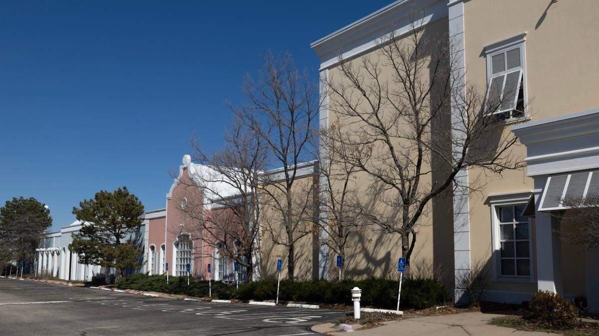 The former Royal Caribbean building in south Wichita has a Caribbean feel that likely is going to go away when new owner Lange Cos. repaints the building a unified color and moves in.