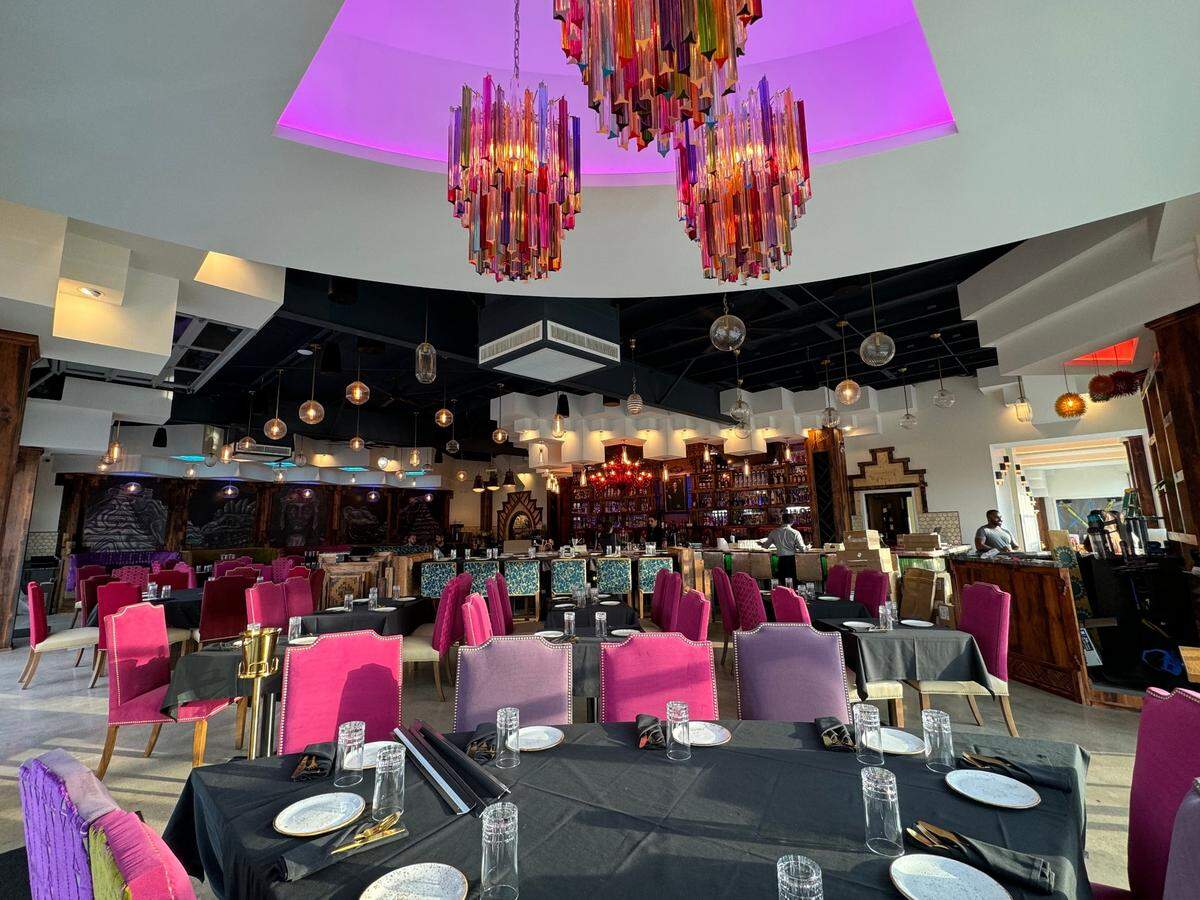 The dining room at Itzali Tapas & Tequila is full of bright colors and whimsical furniture.