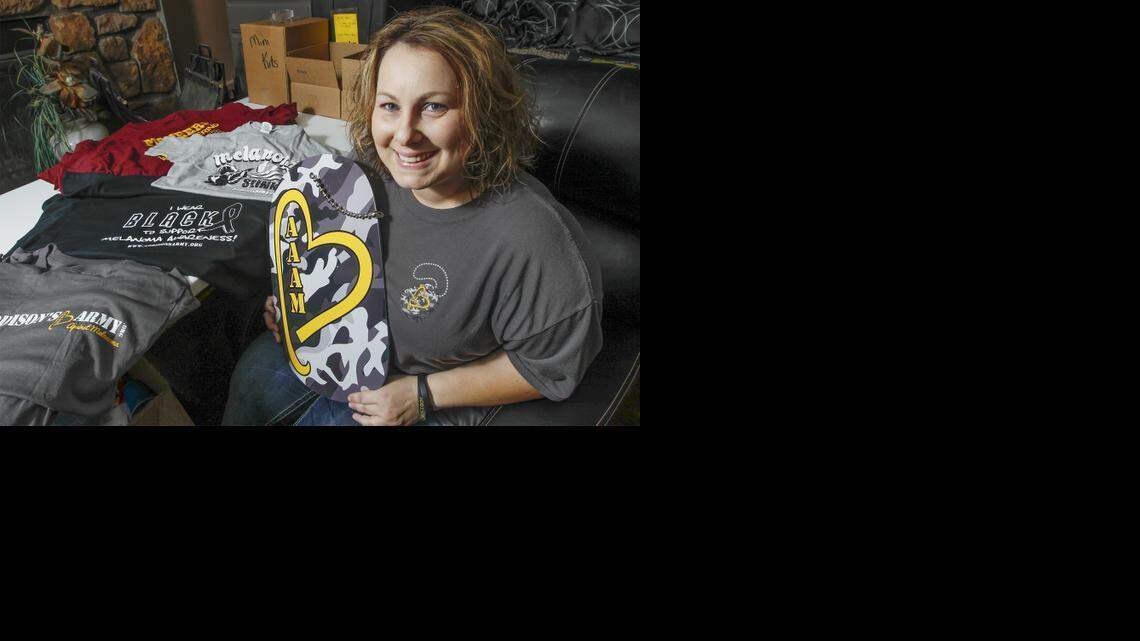 Kimberly Rubio helped co-found Addison’s Army Against Melanoma after her friend, Briana Cox, 33, and Cox’s daughter Addison, 2 years old, died of melanoma. Rubio has distributed nearly 70,000 coloring books to schools to inform children about how to protect themselves from the sun. Addison’s Army also has received a $25,000 grant from State Farm Insurance to help distribute more educational information. Photographed at her home in west Wichita. (Aug. 1, 2014)

