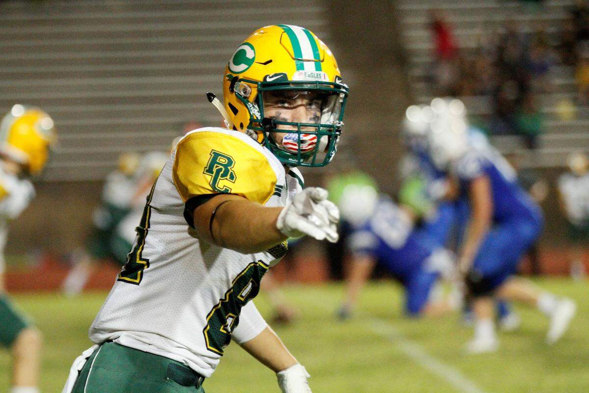 Bishop Carroll senior receiver Mason Baalman checks with the referee before a play during the Golden Eagles’ 28-14 win at Kapaun on Friday. (Oct. 5, 2018)