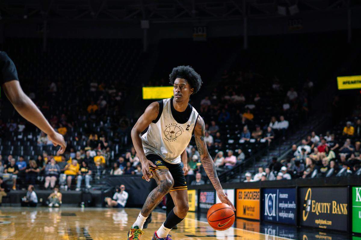 Wichita State newcomer Jaret Valencia scored a game-high nine points, including the game-winning 3 as time expired to lift the white team to a 15-14 win over the black team in Saturday’s Shocker Madness event at Koch Arena.