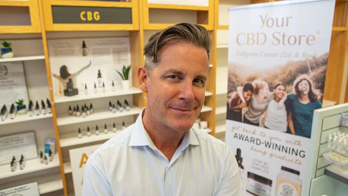 Florida-based Your CBD Stores Franchising has sued former franchisee Brett Harris in federal court over more than $363,000 it said he owes. Harris is shown in a file photo from 2020 when he opened one of his CBD stores.